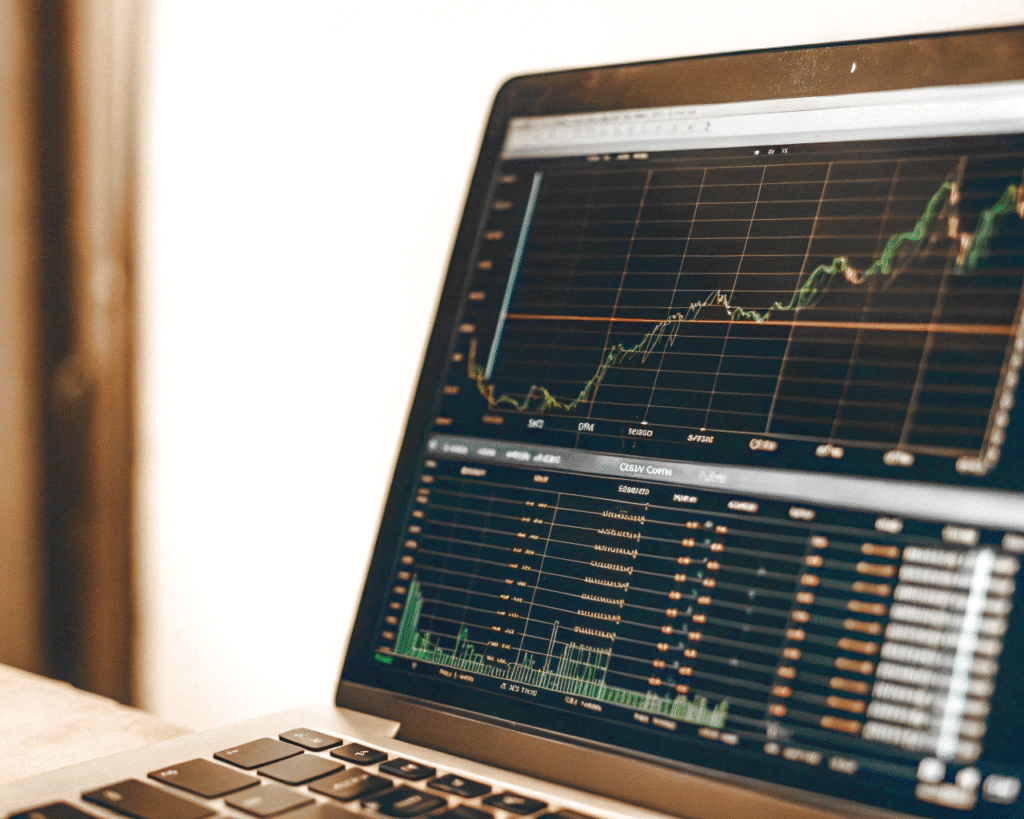 laptop-monitor-screen-with-investment-scale laptop-monitor-screen-with-investment-scale